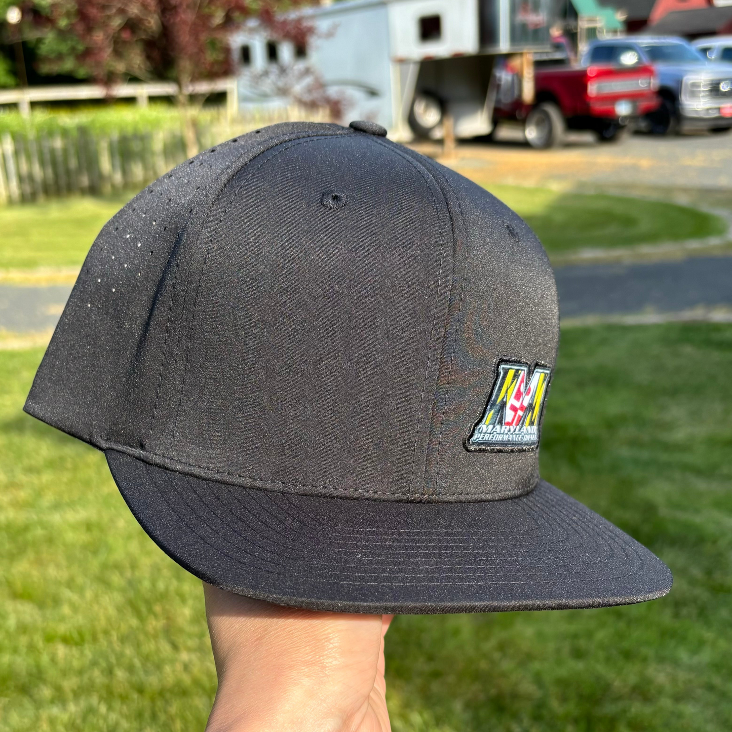 BLACK 6 PANEL - LASER PERFORATED PERFORMANCE // FLAT BRIM SNAPBACK
